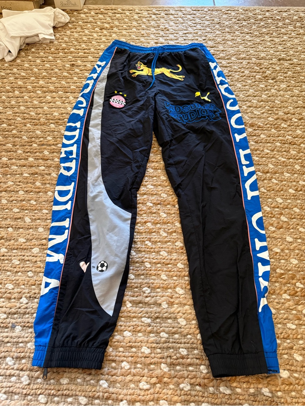 Puma Kids Super Studios Black Joggers with Blue & Gray Panels and Yellow Details